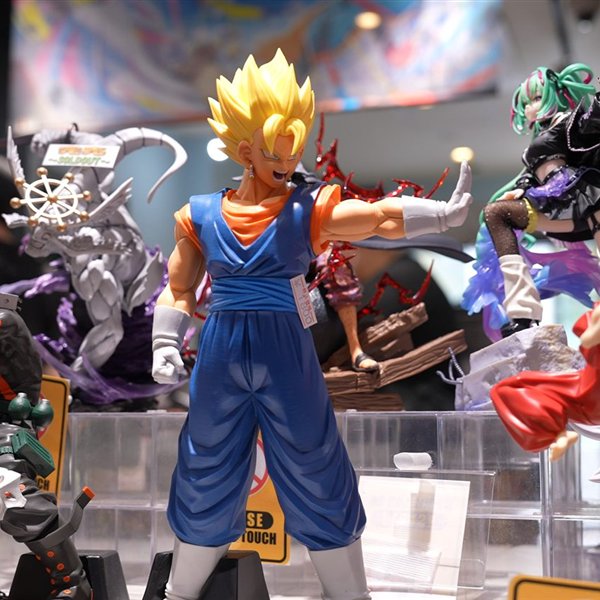 Anime figures on the shelves at MACH